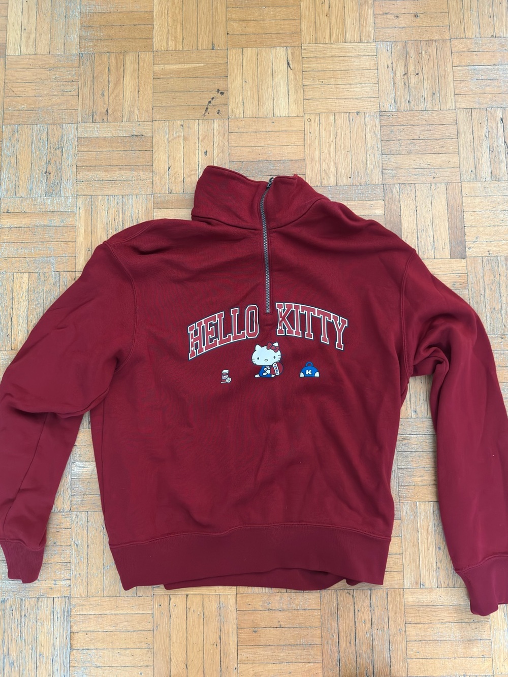 Uniqlo kids hello kitty quarter zip sweater
